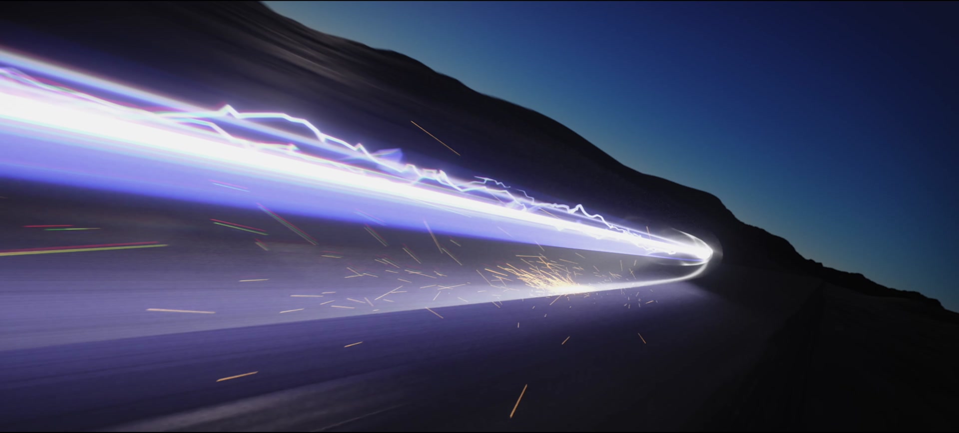 Electric light arcs along a mountain road at dusk.