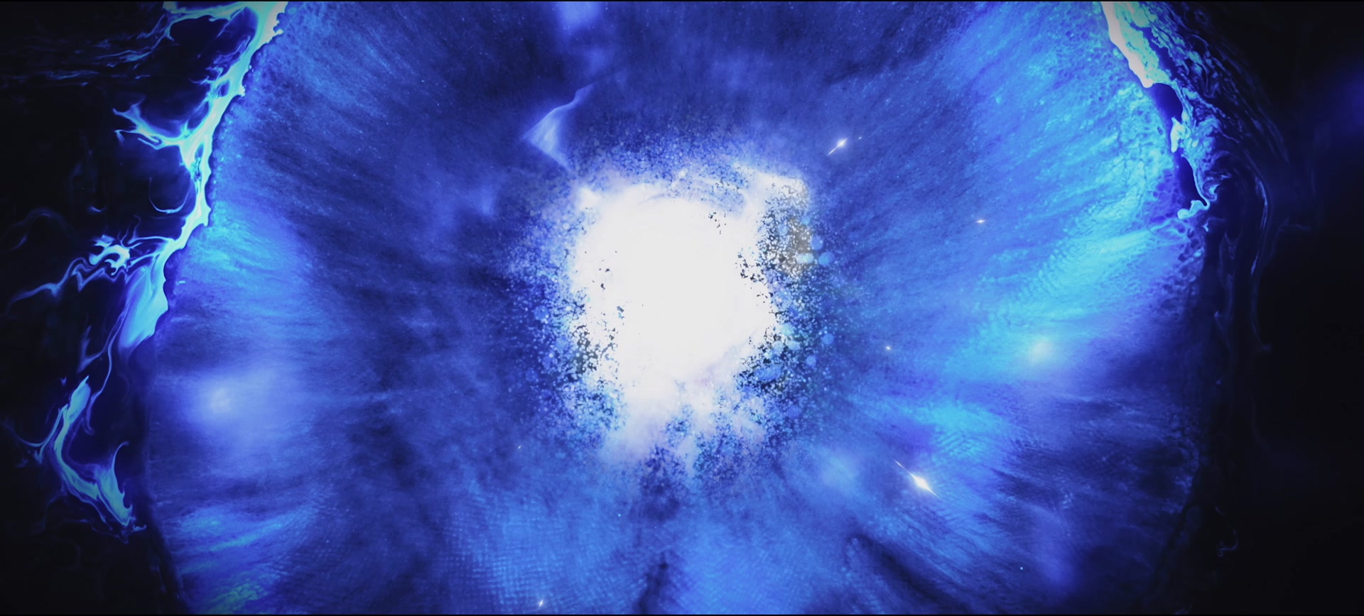 A blue energy iris surrounds a luminous centre.