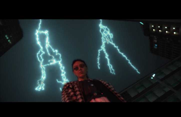 gucci KIWI LEE nocturnal animals — Performer beneath lightning imagery