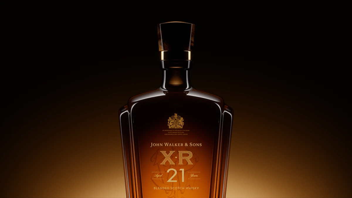Johnnie Walker XR21 bottle against a warm amber gradient