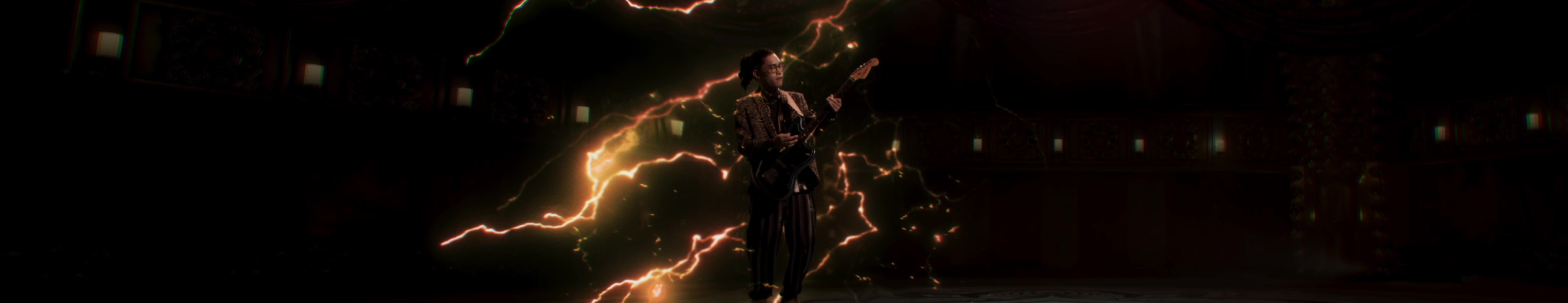 A guitarist performs amid branching golden lightning in the CircUs opening film.